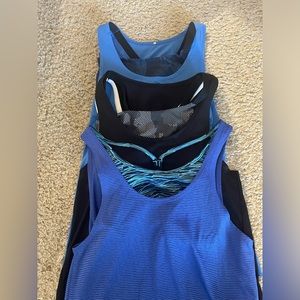 Bundle of 3 workout tanks with built in sports bras